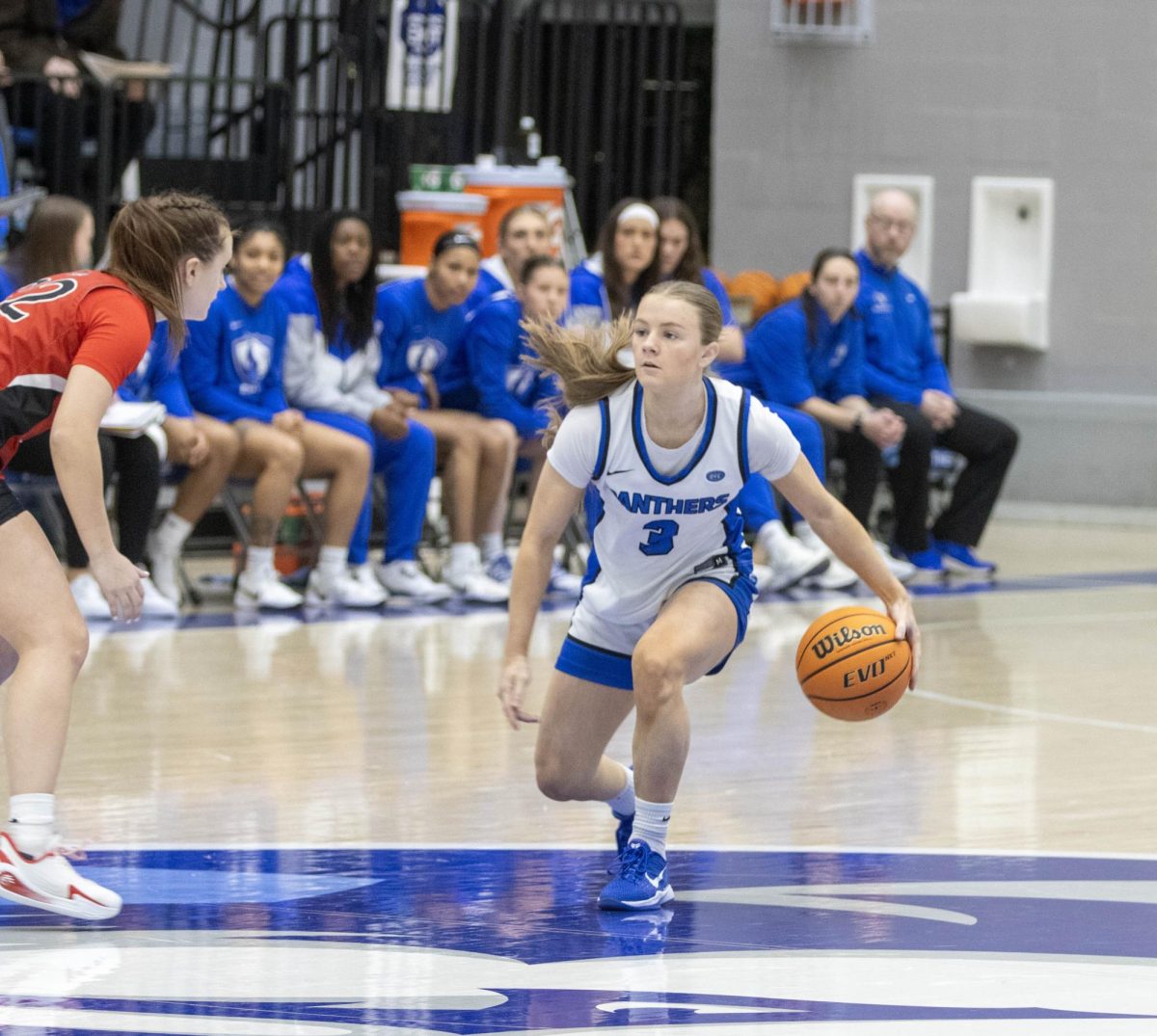 EIU women’s basketball junior guard Ava Stoller dribbles past half-court near the start of the game against Southeast Missouri State.  Stoller led the team in points with 22 as EIU lost 71-56 at Groniger Arena on Saturday.