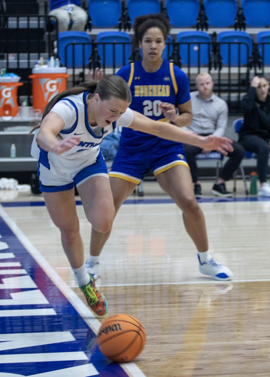 Junior Ava Stoller gets pushed to the ground by Morehead State's graduate student Kate Dike on Friday in Groniger Arena. Stoller scored 20 points against Morehead State.