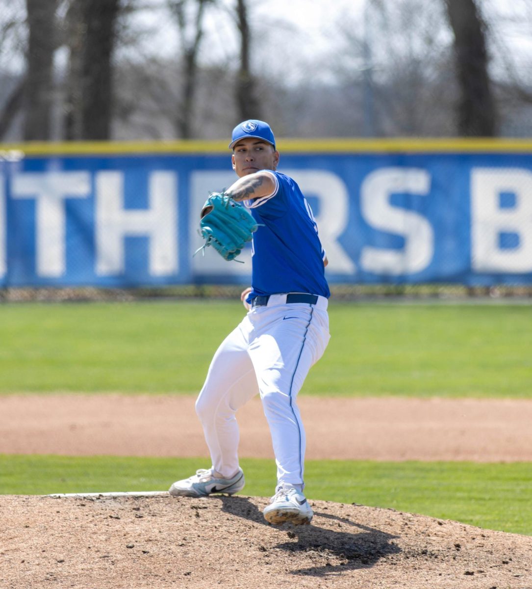 Starting pitcher Junior Anthony Solis winds up to deliver a pitch to a Morehead State batter during EIU baseball’s 8-5 loss to Morehead State on Sunday.