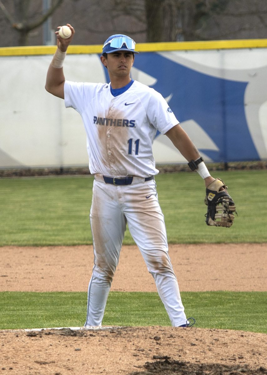 Utility graduate student Tyler Castro throws the ball to his teammate in between innings during the baseball game against the Northern Illinois University huskies on Tuesday in Coaches Stadium. Castro completed 1 hit and 3 at-bats during the panther's 5-4 loss.