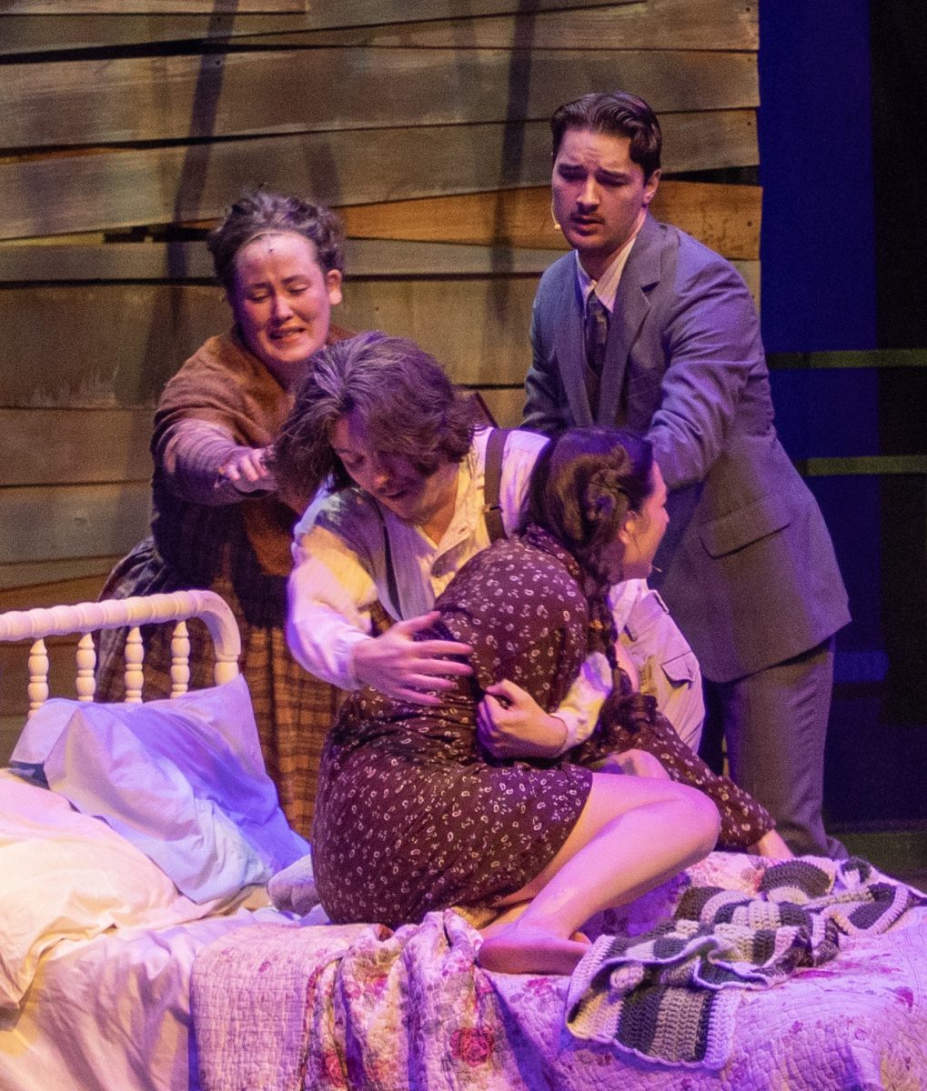 Bri Olshawsky’s character Alice, gets her baby taken from her after giving birth. Alice’s father allows Mayor Dobbs, Jimmy Ray’s father, to take the baby to give it up for adoption in the musical, Bright Star. Bright Star occurred from Friday, Feb. 27, 2026 until Sunday, March 8, 2026 in Doudna Fine Arts Center.