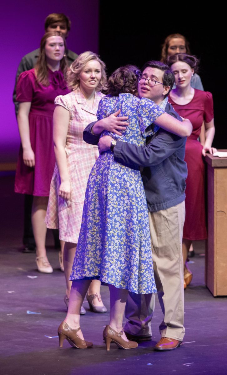Bri Olshawsky’s character, Alice and Gentry Copsy’s character, Billy Cane hug after Billy Cane accepts that Alice is his biological mother during Bright Star. Bright Star occurred from Friday, Feb. 27, 2026 until Sunday, March 8, 2026 in Doudna Fine Arts Center.
