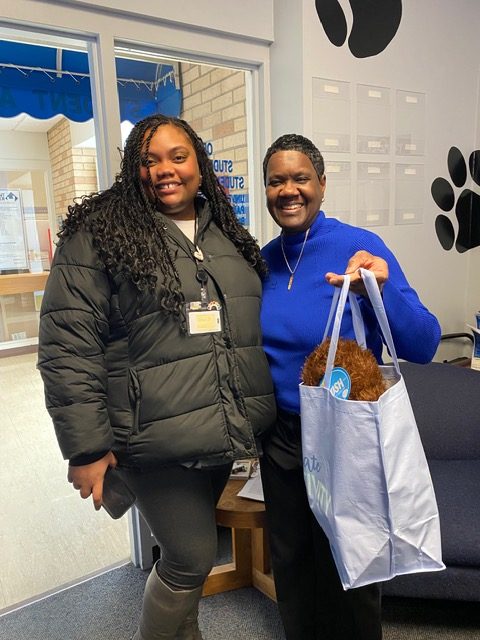 Paris Daniels (Left) and Ceci Brinker (Right) are both present at Brinker's Retirement Party on Wednesday, Jan 28 in the Martin Luther King Jr. Union. Brinker is holding a gift that Daniels brought her.