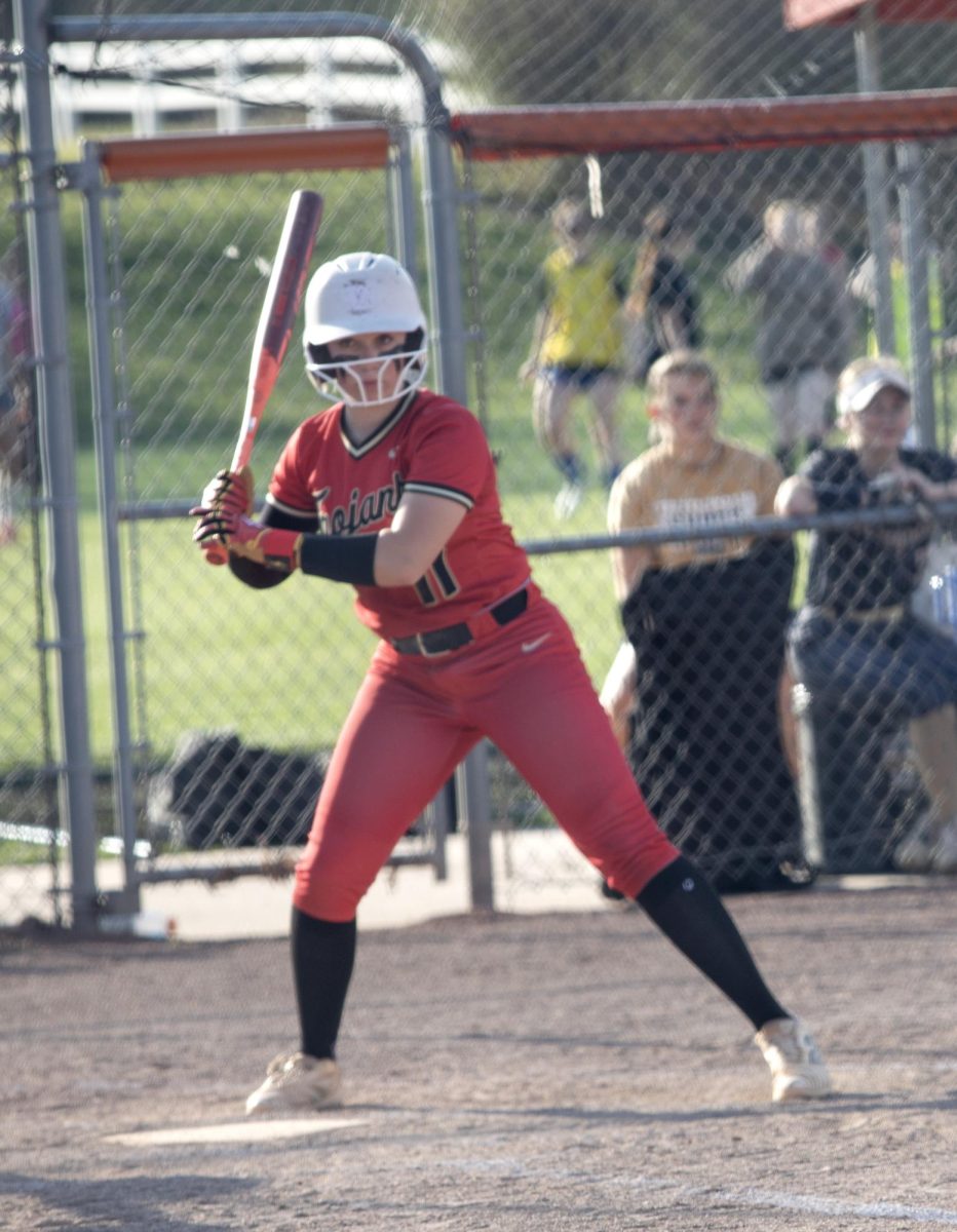 Charleston High School trojan softball player Lainie Keefer bats during the game on Thursday against the Teutopolis High School wooden shoes where CHS would lose 14-4.
