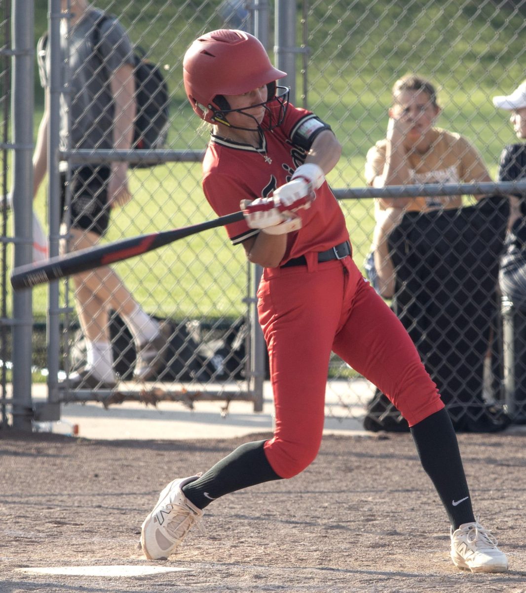 Charleston High School trojan softball player Meg Ritchey bats during the game on Thursday against the Teutopolis High School wooden shoes where CHS would lose 14-4.