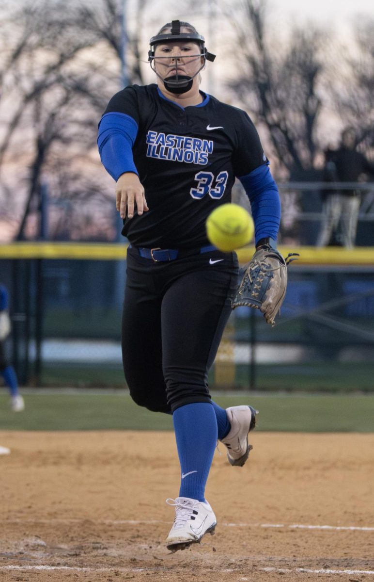 Eastern Illinois softball senior pitcher Bryanna French pitches during the game against Lindenwood University on Friday. There were runners on base different bases and EIU won in a 14 inning 12-11 on Williams Field.
