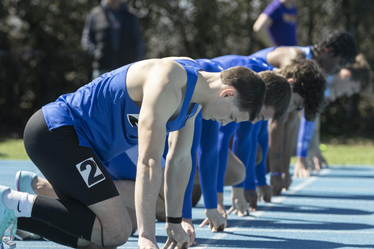 Eastern Illinois University freshman field hurdler Maxwell St. Clare gets set to take off against the rest of the field at the Big Blue Classic on Saturday.