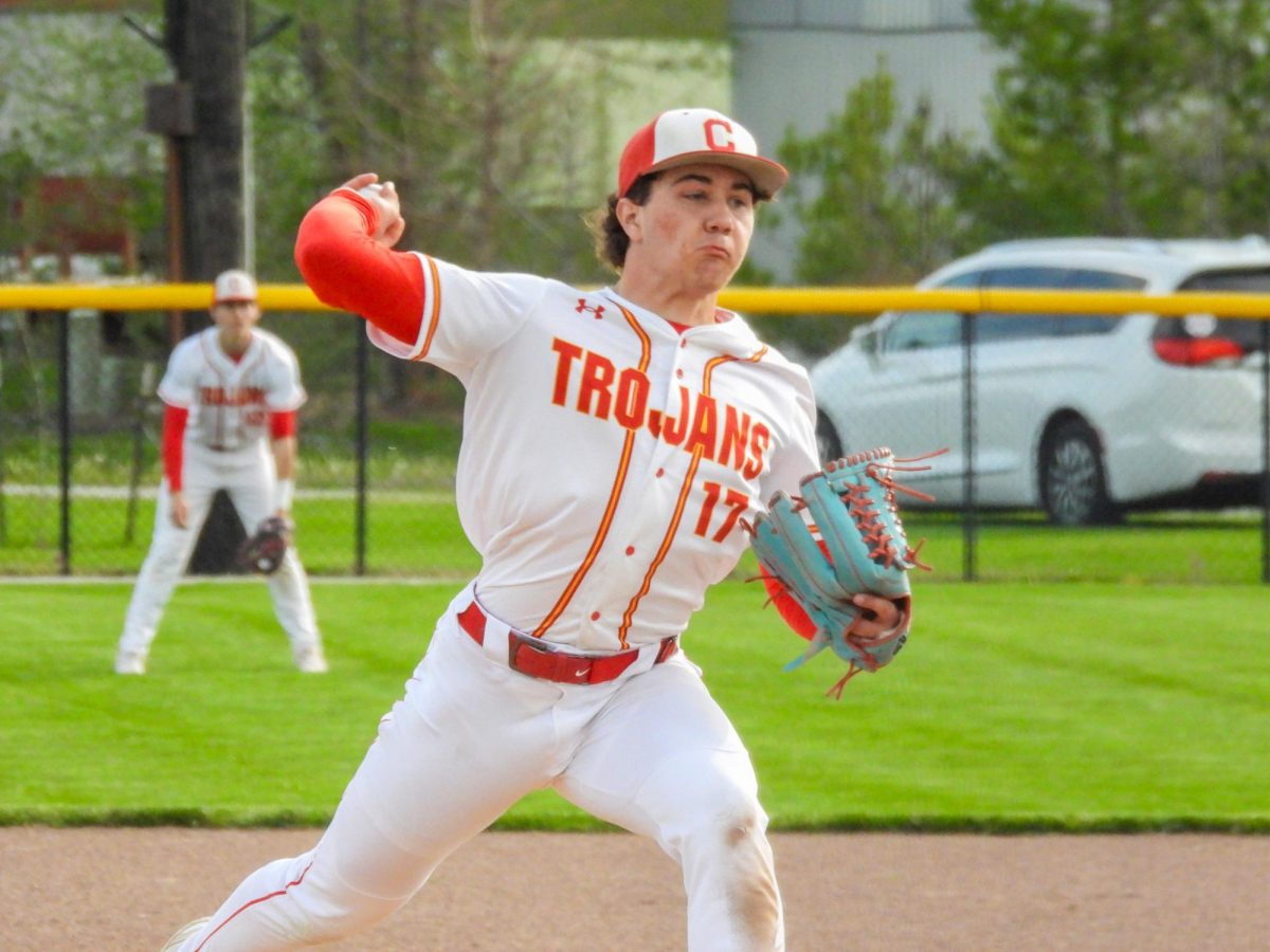 Charleston High School junior pitcher Wyatt Gordon throws a pitch in the second inning of the Trojans 12-6 loss against Effingham High School at Baker Field on Wednesday.