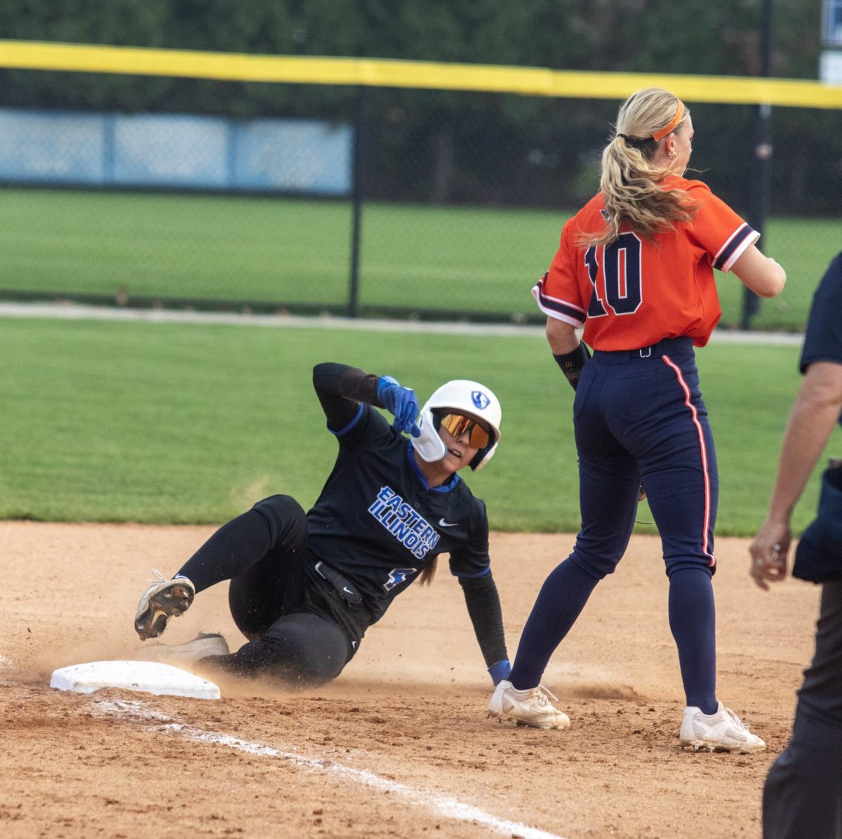 From left, Eastern Illinois University softball sophomore outfielder Mo Hance slides into third base as UT Martin senior utility player Dylan Scott waits for the ball to be thrown on Friday April in the team’s 5-4 win in nine innings over Eastern Illinois University at Williams Field.