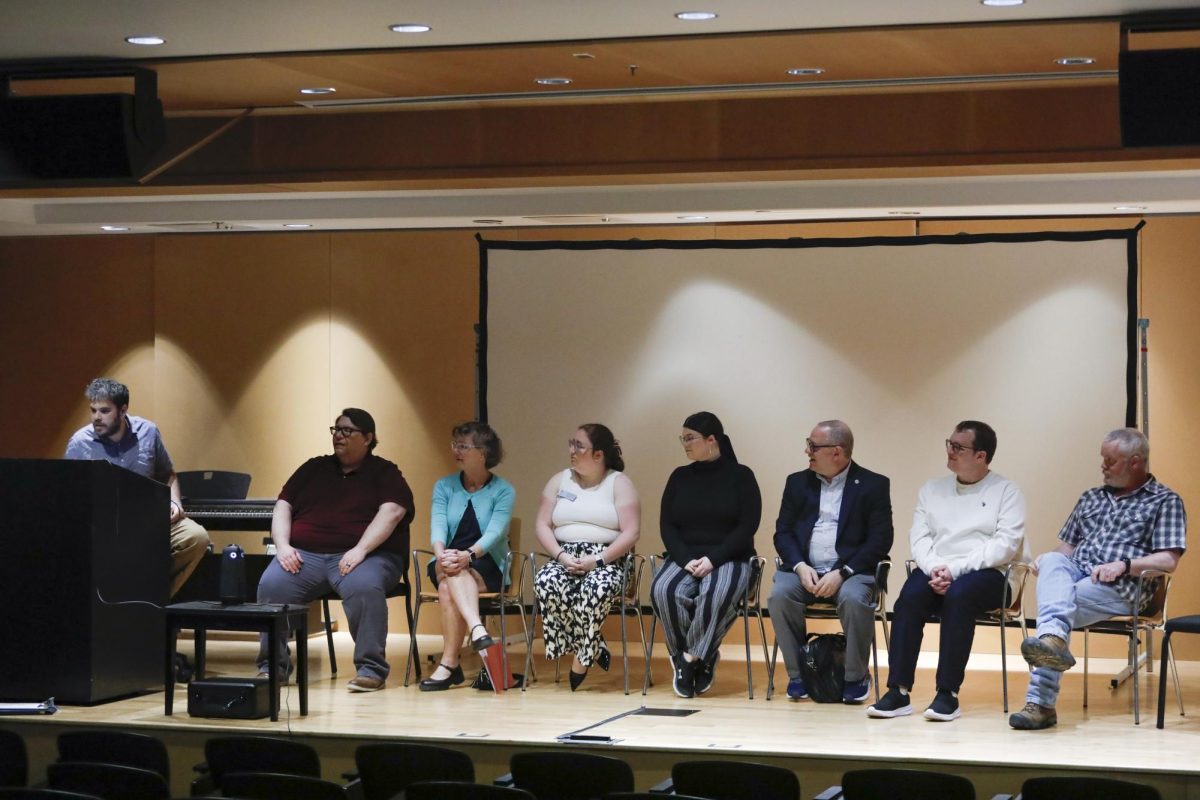 The panel of EIU faculty and students sit together during the Faculty Forum on Wednesday in the Lecture Hall in Doudna Fine Arts Center. There were seven panelists during the forum on Wednesday.