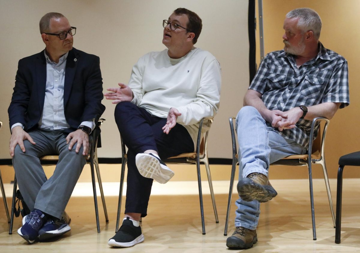 Graduate student Jonny Coffin, a certified peer educator in the Academic Support Center responds to questions during the Faculty Forum on Wednesday in the Doudna Fine Arts Center.