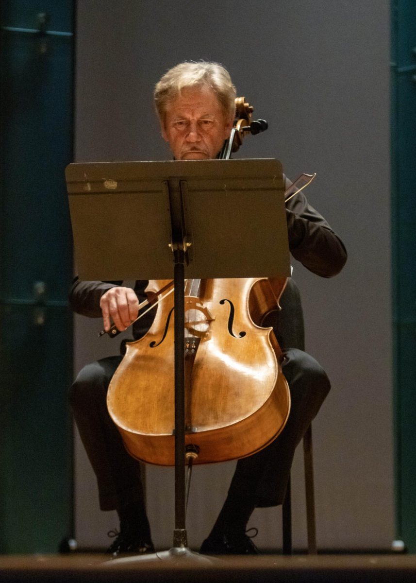 Eastern Illinois University music faculty member David Commanday plays the cello for Beethoven’s Septentrional during the EIU Faculty Chamber Concert at the Doudna Recital Hall on Monday night.