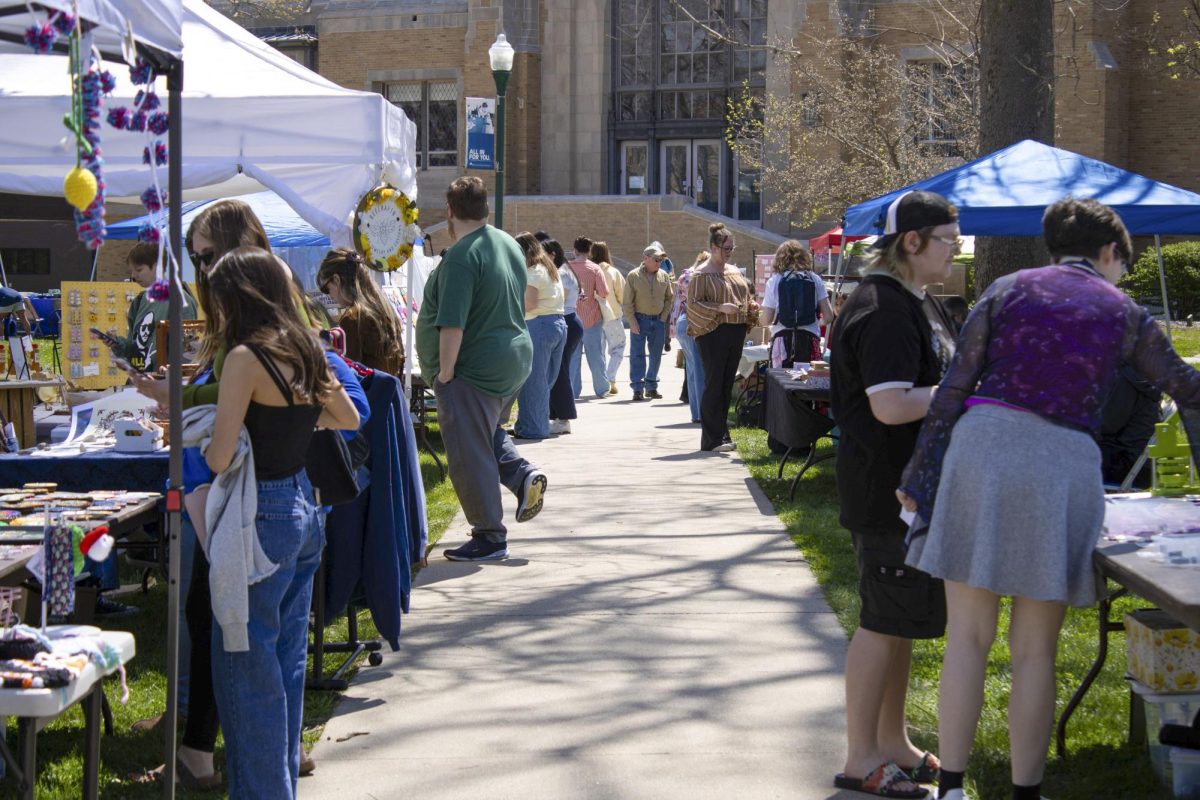 Community members and EIU students attend the Small Business Fest on Saturday to support the many small businesses showcased at the event held in the Library Quad.