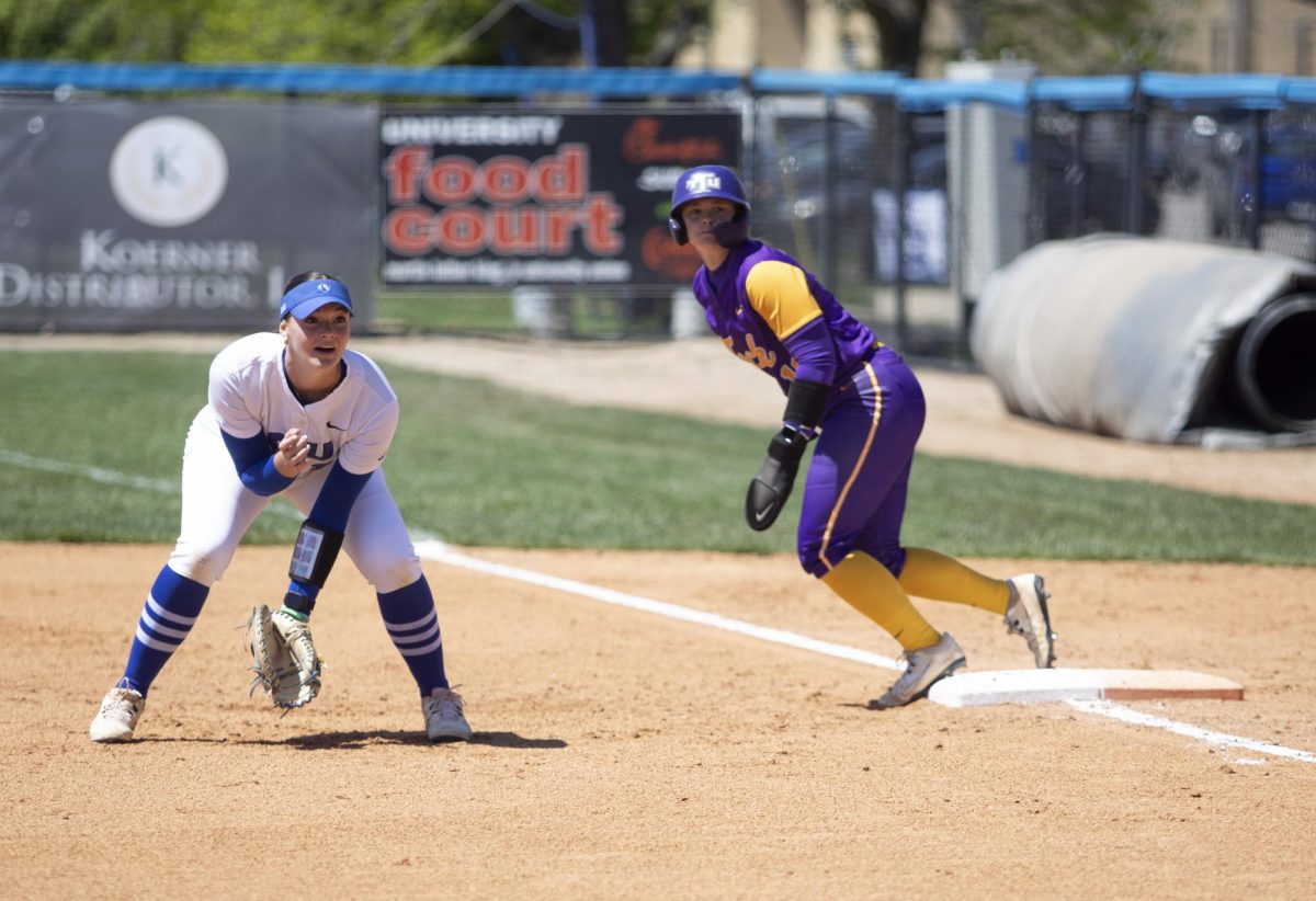 Utility sophomore Abbi Hatton goes to catch the ball in the last game of the softball series against Tennessee Tech on Sunday at Williams Field. Hatton earned 1 hit.