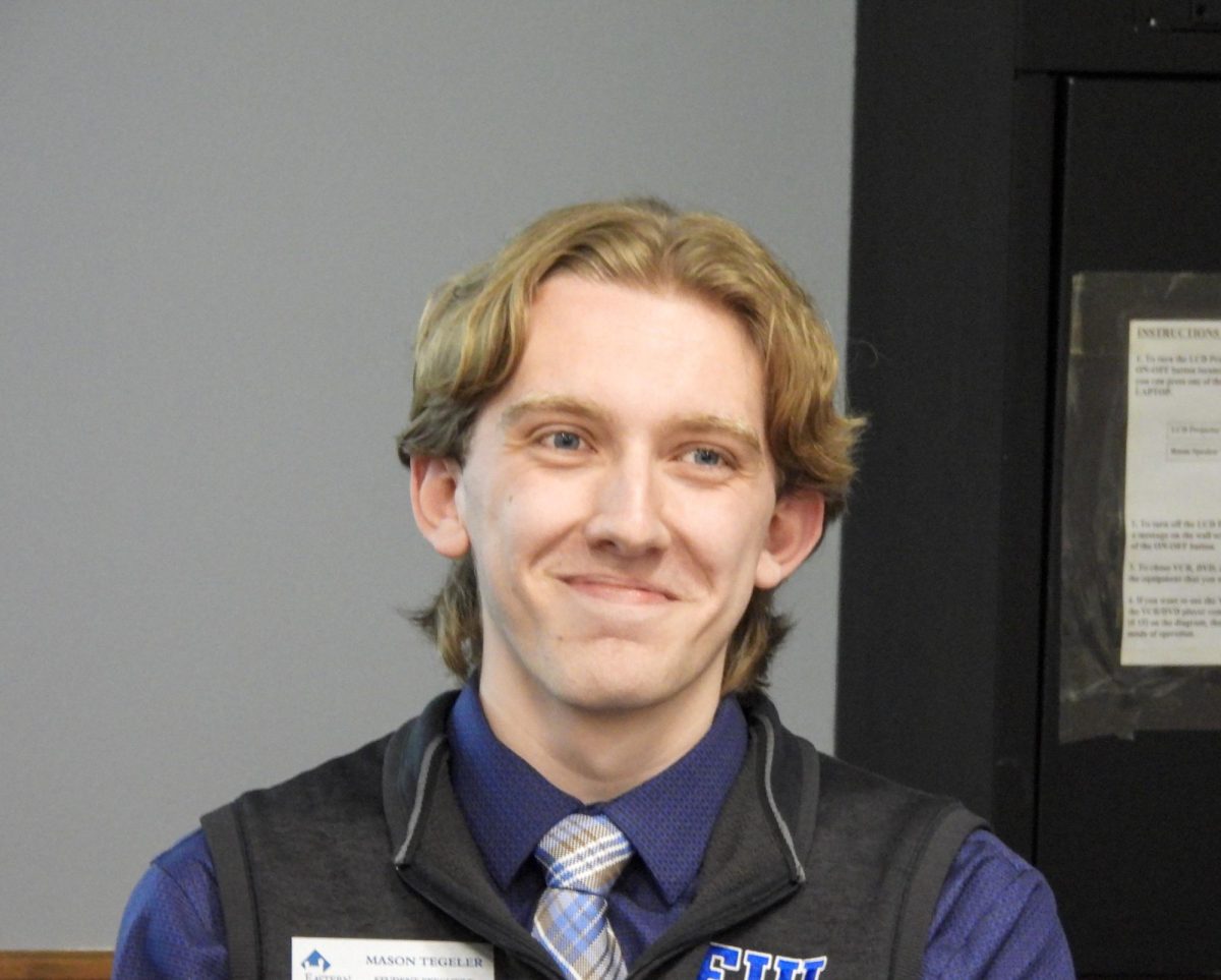 Executive Vice President Mason Tegeler smiles as he is announced as the next Student Body President at the student senate meeting in the Arcola-Tuscola room on Wednesday in the Martin Luther King Jr. Student Union.