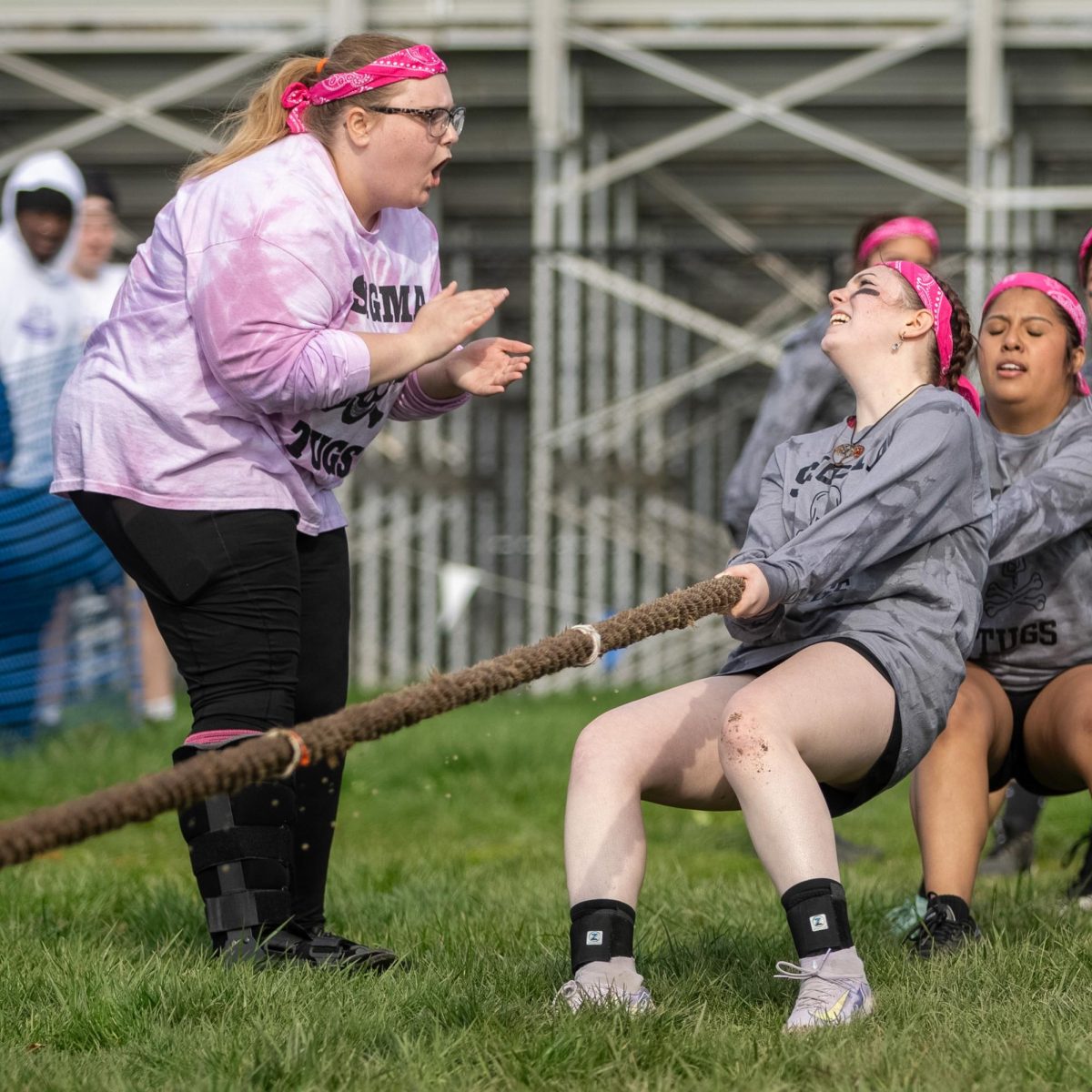 Sigma Sigma Sigma member Sara Street looks to Courtney Crawford as Street tries to pull the rope at the Tugs event during Greek Week across the campus pond on Wednesday afternoon. Tri Sigma went against Alpha Sigma Alpha and lost.