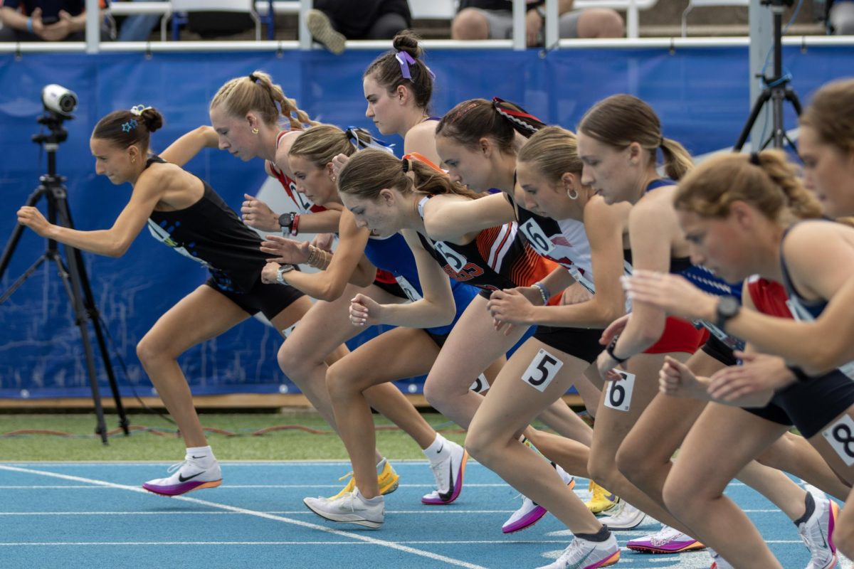 Runners in the Class 1A 1600-meter race break from the starting line at the IHSA girls' state track and field meet at O'Brien Field on Eastern Illinois University's campus in Charleston on Saturday.