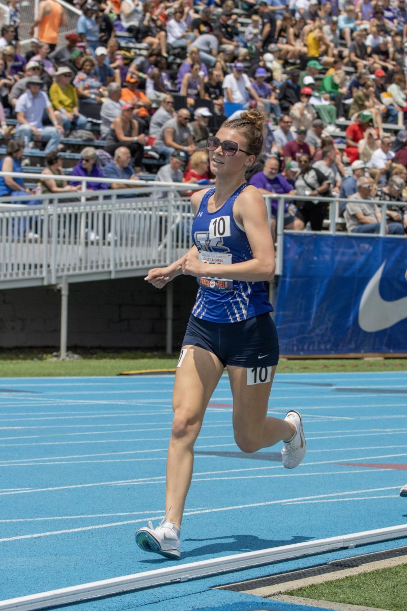 Senior Knoxville runner Emily King runs during the Class 1A 3200-meter race at the IHSA girls' state track and field meet at O'Brien Field on Eastern Illinois University's campus in Charleston on Saturday.