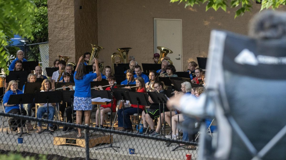 The Charleston Community Band performs for its first concert of the summer at Kiwanis Park on Thursday. The band will be playing weekly at the park with a patriotic concert on July 2. 