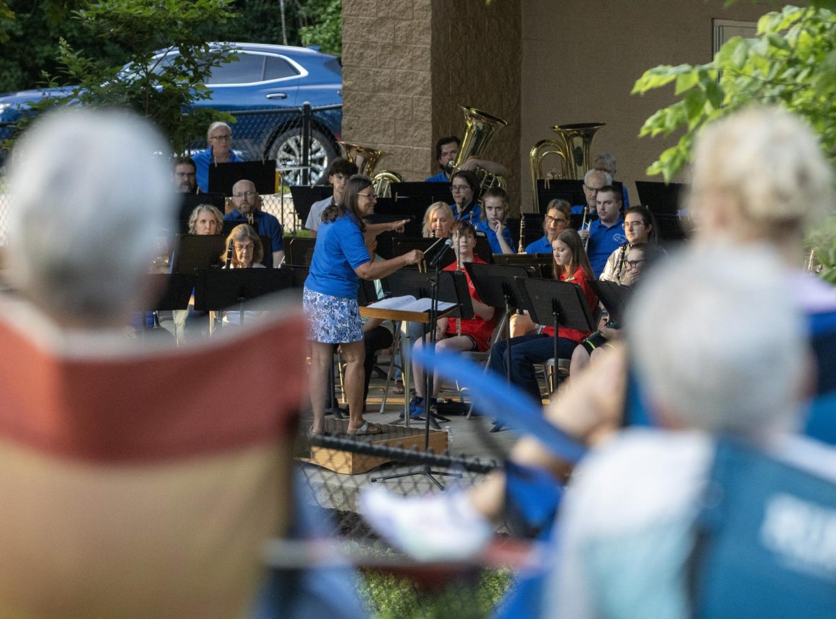 The Charleston Community Band performs for its first concert of the summer at Kiwanis Park on Thursday.