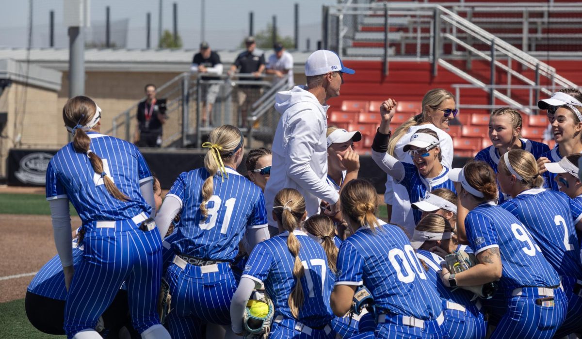 Eastern Illinois University softball team huddles together before the first game of the OVC championship at OSF Healthcare Field at the Louisville Sports Sluggers Complex on Saturday.