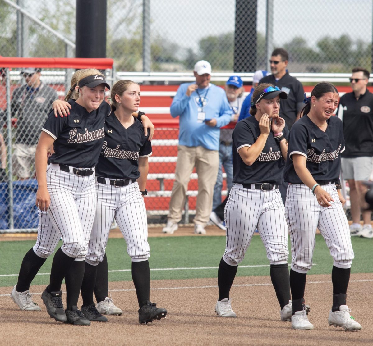 The Lindenwood softball team walks off the field in tears after losing in the OVC championship game at OSF Healthcare Field at the Louisville Sports Sluggers Complex on Saturday.