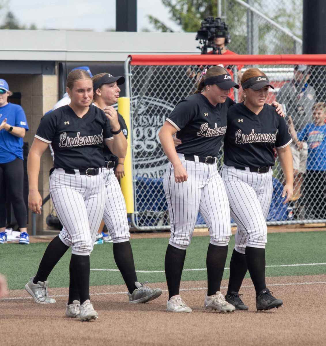 The Lindenwood softball team walks off the field in tears after losing in the OVC championship game at OSF Healthcare Field at the Louisville Sports Sluggers Complex on Saturday.