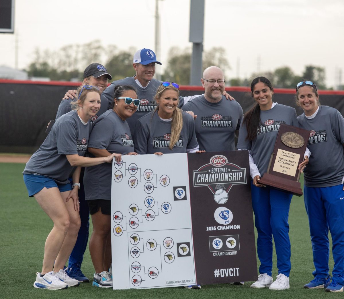 The coaches of the Eastern Illinois University softball team pose for a photo after winning the OVC championship at OSF Healthcare Field at the Louisville Sports Sluggers Complex on Saturday.