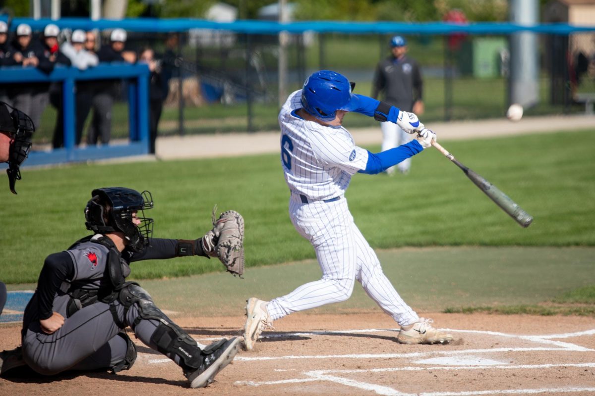 Graduate student infielder Brett Stanley hits a ball towards left field during EIU baseball's win over SEMO at Frost Field on Saturday.