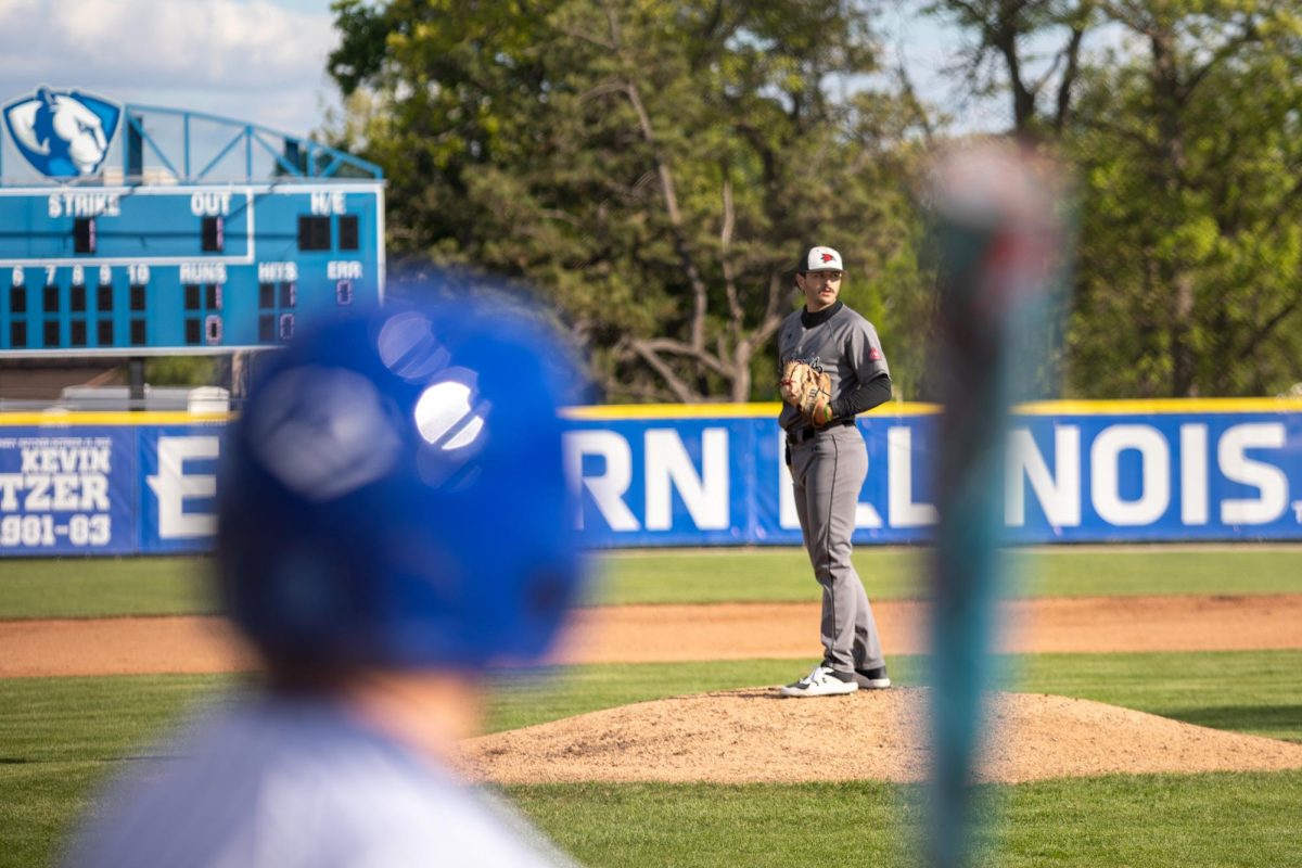 SEMO senior pitcher Mason Pennington looks towards first base before pitching during EIU baseball's win over SEMO at Frost Field on Saturday.