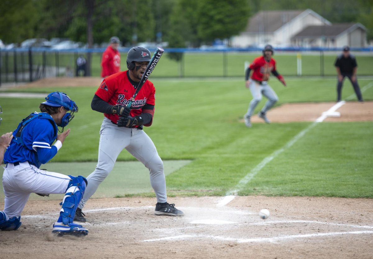 SEMO senior Ranard Grace yells at SEMO senior Carson Schrack in the third game of the series against EIU on Sunday at Frost Field.