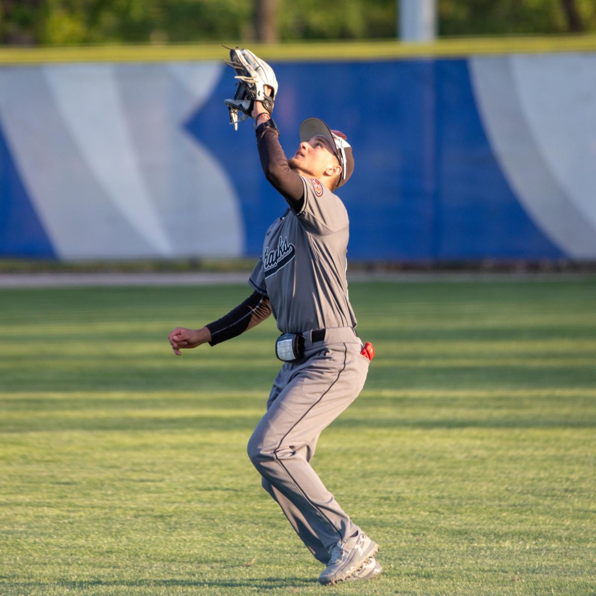 SEMO senior outfielder Demitri Shakotko attempts to catch a pop fly during EIU baseball's win over SEMO at Frost Field on Saturday.