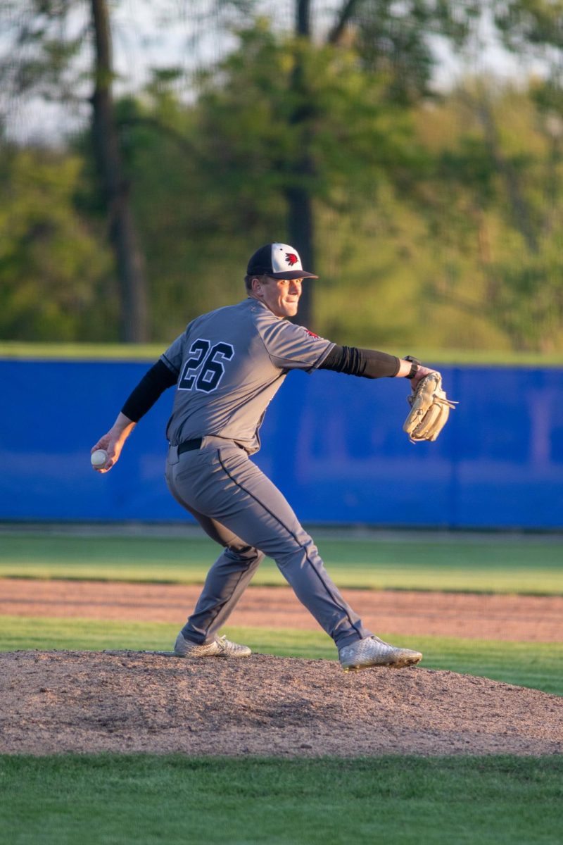 SEMO baseball senior pitcher John Klus winds up to throw a pitch during EIU baseball's win over SEMO at Frost Field on Saturday.