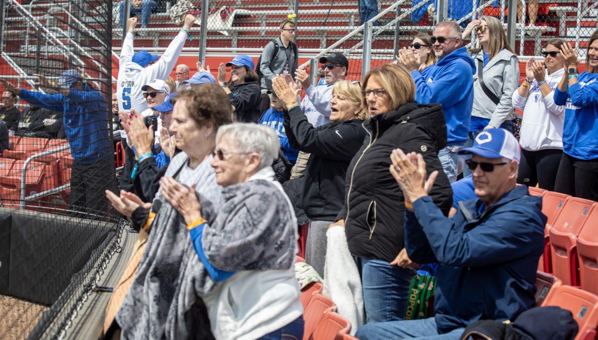 Fans of the Eastern Illinois University softball team cheer on the team during EIU’s 7-6 win against Southeast Missouri State in the first round of the Ohio Valley Conference tournament at OSF Healthcare Field at the Louisville Sports Sluggers Complex on Thursday.