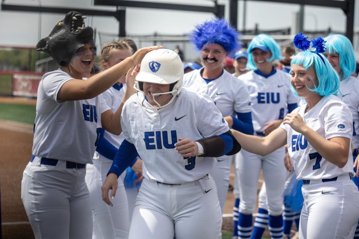 Eastern Illinois University softball senior catcher Lexie Griffin runs through a tunnel of her teammates after her home run during EIU’s 7-6 win against Southeast Missouri State in the first round of the Ohio Valley Conference tournament at OSF Healthcare Field at the Louisville Sports Sluggers Complex on Thursday.