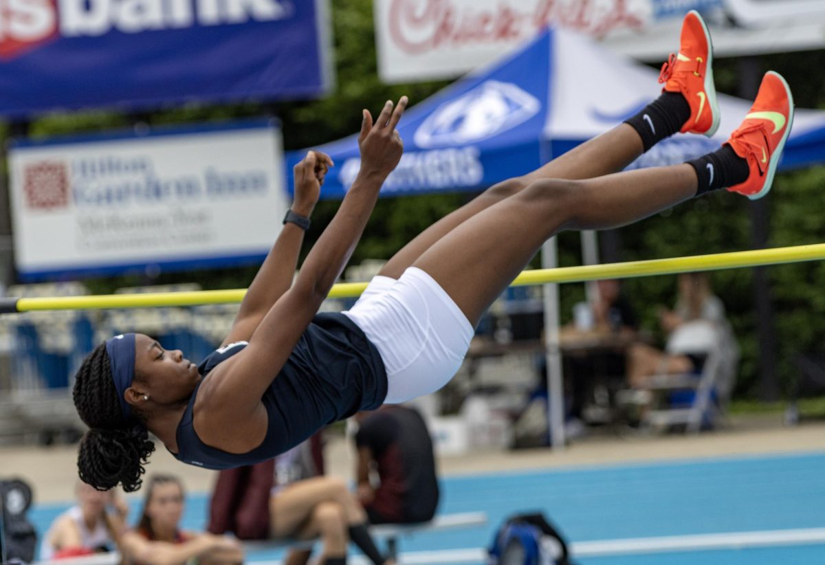 Belleville East sophomore Ramiyah Young high jumps at O'Brien Field on Eastern Illinois University's campus in Charleston on Saturday.