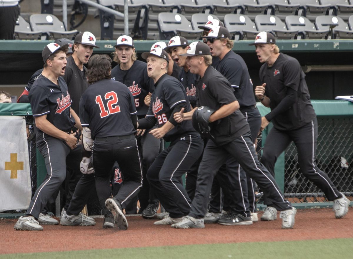 Southeast Missouri senior infielder Andrew Ramirez celebrates with his team after hitting a homerun off of Ohio Valley Conference pitcher of the year Bryce Riggs during Eastern’s 3-2 win over Southeast Missouri in the OVC tournament.