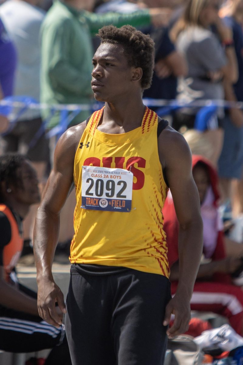 Charleston high school junior Treylin Couch looks towards a crowd before the class 2A triple jump at the IHSA Boys Track & Field State Meet at O’Brien Field on the EIU campus in Charleston, Ill. on Friday May 29, 2026.