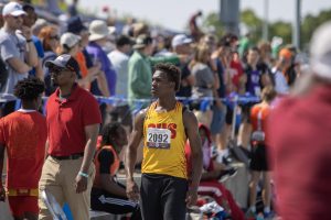 Charleston high school junior Treylin Couch looks towards a crowd before the class 2A triple jump at the IHSA Boys Track & Field State Meet at O’Brien Field on the EIU campus in Charleston, Ill. on Friday May 29, 2026.